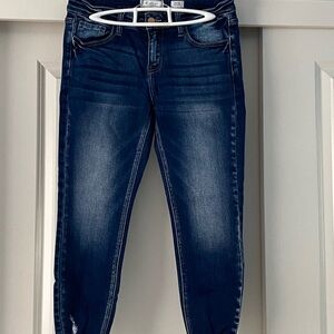 Womens KanCan skinny jeans, dark blue wash with distressed cuffs.